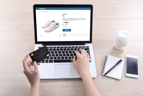 Woman,Use,Ecommerce,Webshop,For,Buy,Shoes,With,Holding,Credit Ecommerce-Marketing-Consultant-Vermont